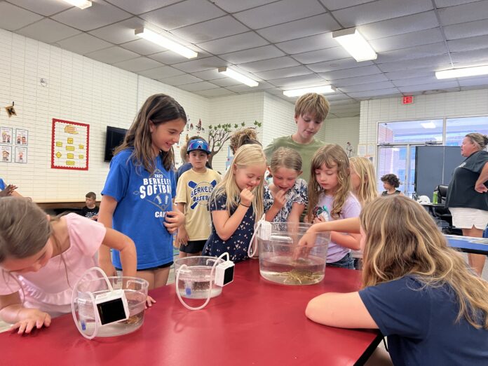 South Carolina Aquarium Education Outreach _ Students touch marine invertebrates